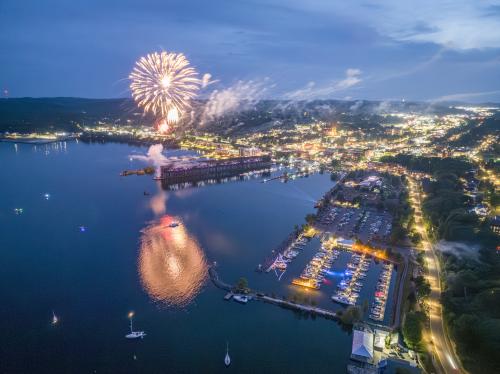 An aerial view of the spectacular fireworks and laser show on Lake Superior for fourth of July in Marquette, MI