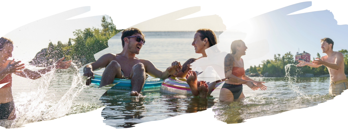 一对情侣在麦卡蒂湾的苏必利尔湖上戏水和漂浮