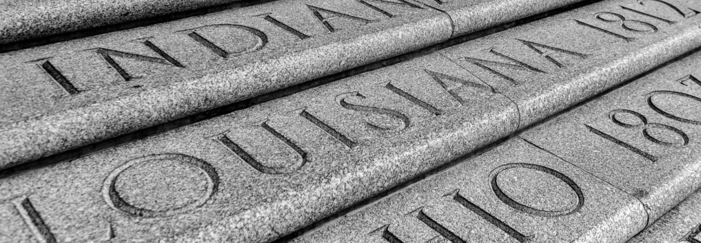 Close up of Louisiana text carved in granite at State Capitol