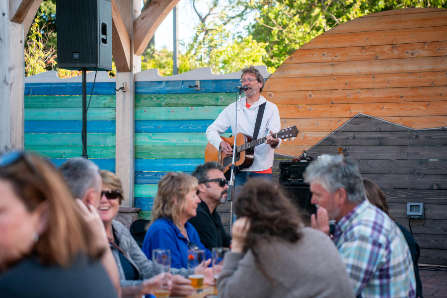 People enjoying live music on the patio of Blackrock's Brewery