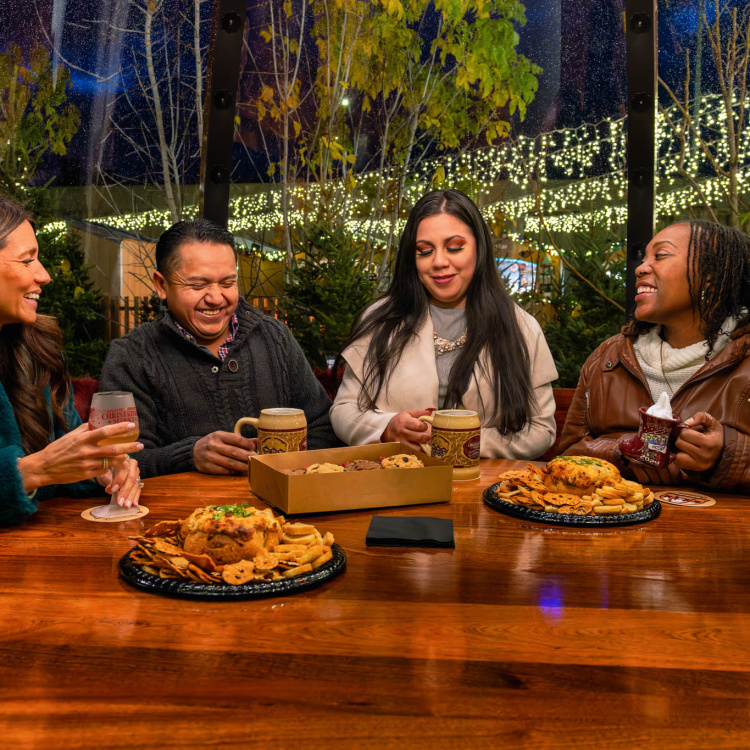People Enjoying A Christkindl Markt Night