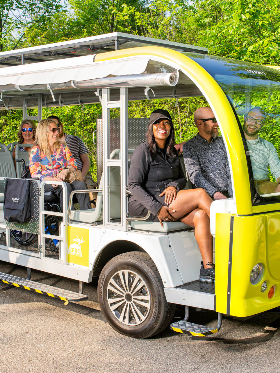 Group taking new tram at Fredrick Meijer Gardens.