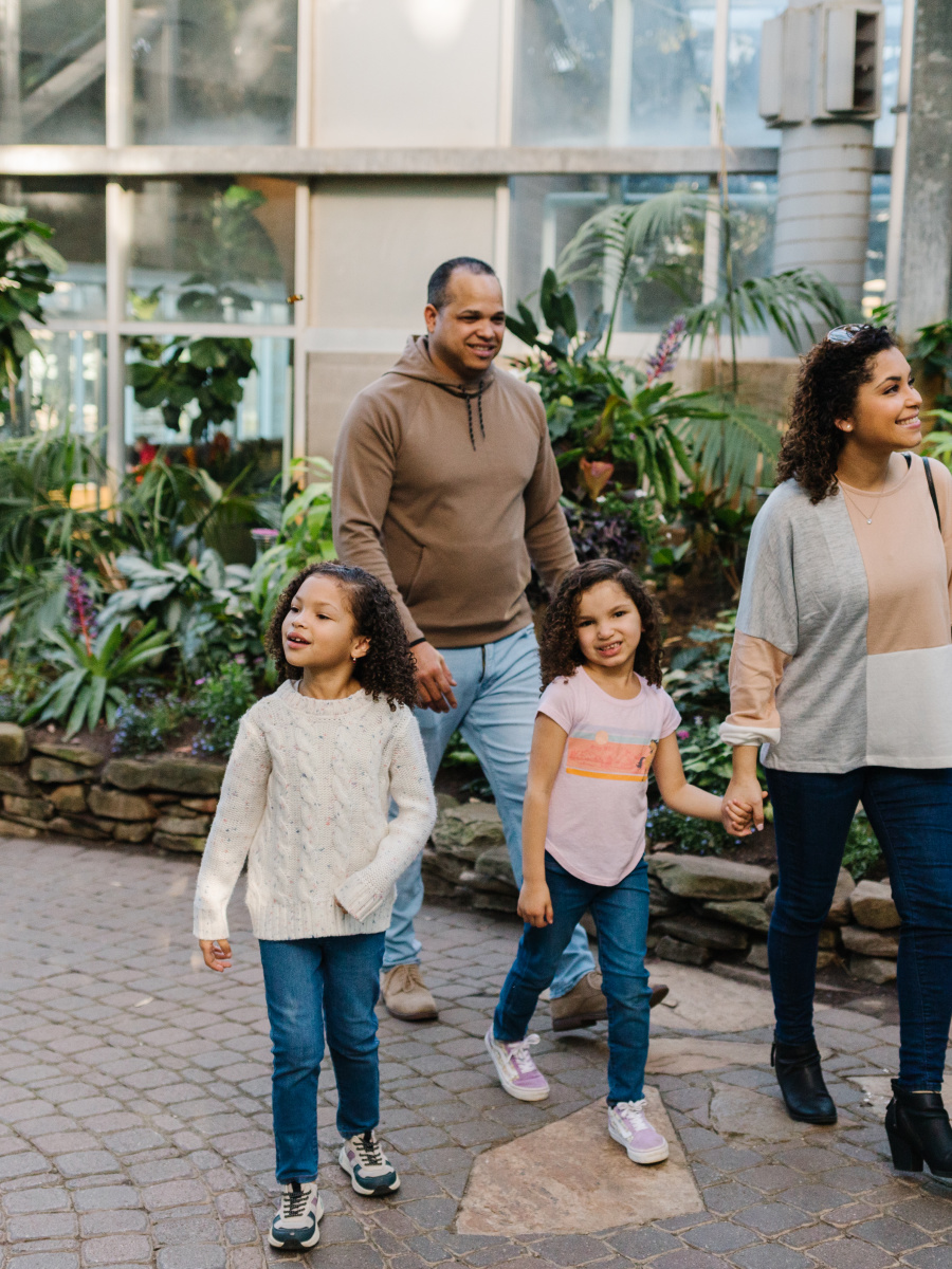 Family experiencing the Butterflies are Blooming Exhibition at the Frederik Meijer Gardens & Sculpture Park.