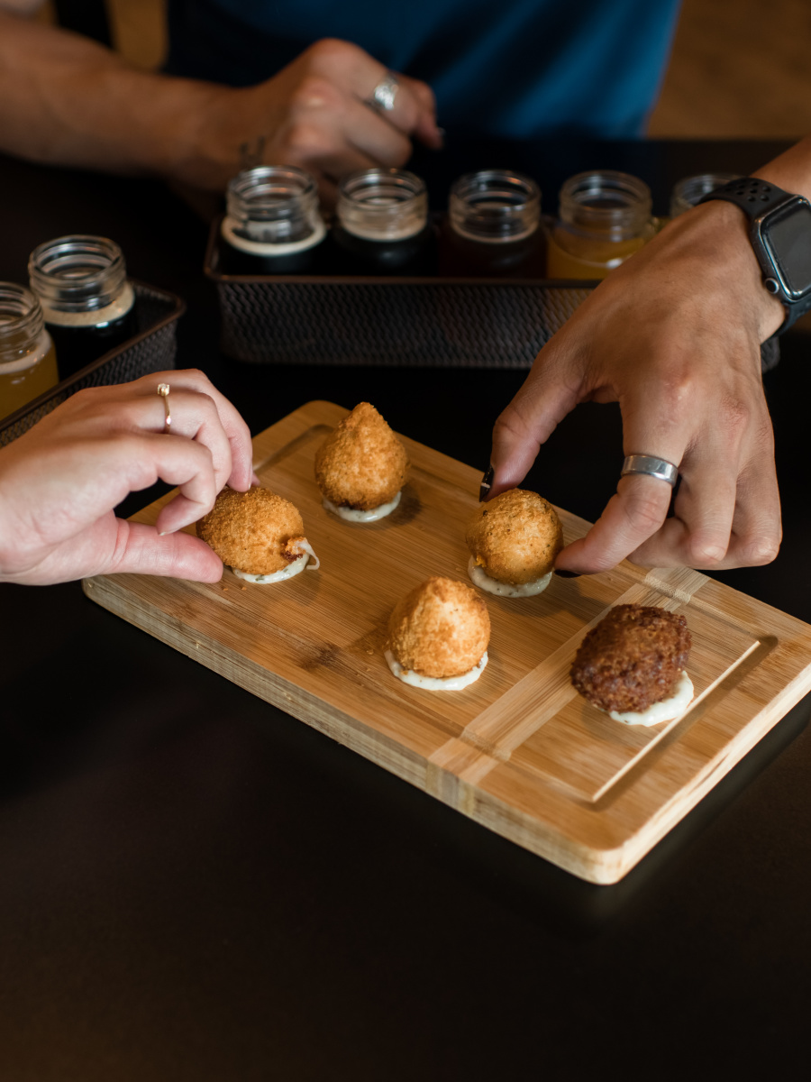 Social squad enjoying Flights of Flavor at 3 Gatos Brewery in Wyoming Michigan