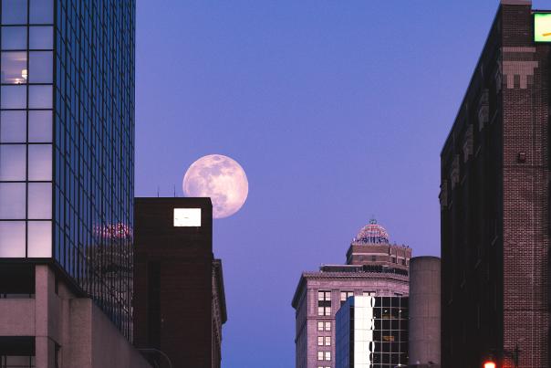 Large moon over downtown Grand Rapids.
