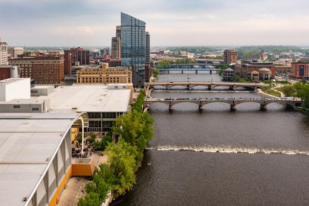 Drone photos of an outdoor event at DeVos Place and the Gillette Bridge near the Grand River in downtown Grand Rapids.