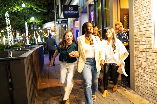 Group of people leaving restaurant