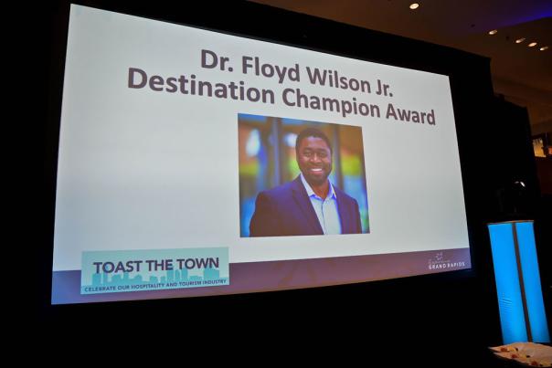 Toast the Town presentation slide of Floyd Wilson, Jr. Destination Champion Award
