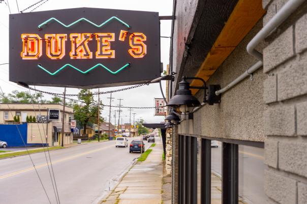 Neon sign in front of Duke's Bar.