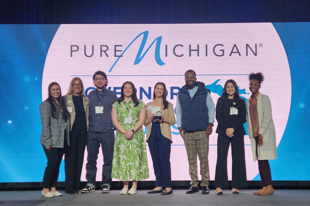Staff accepting Innovative Tourism Collaboration Award