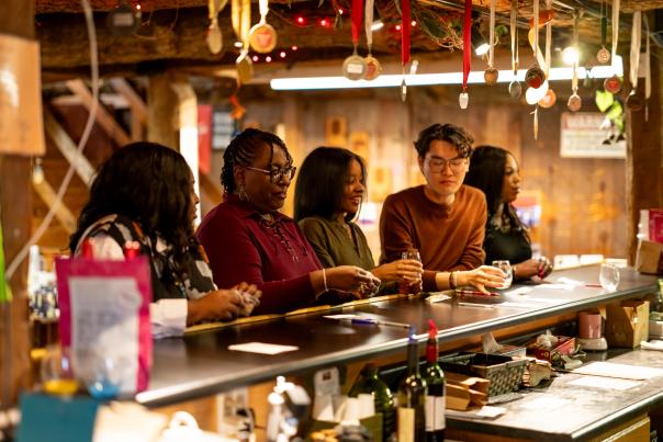 Group participating in wine sampling at Robinette's.