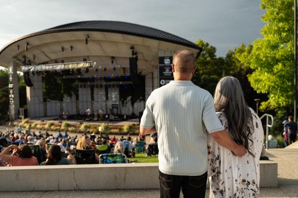 Couples enjoying a summer concert at the Frederik Meijer Gardens and Sculpture Park, 2023