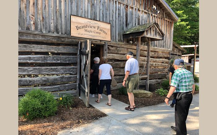 Visitors entering the sugar camp