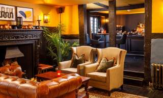 The Tudor Restaurant at voco Lythe Hill Hotel & Spa