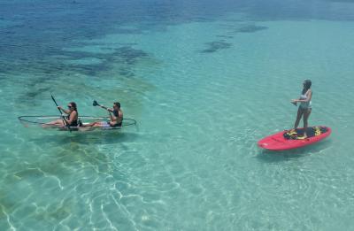 paddleboard and clear kayak
