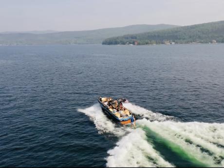 Wakesurfing behind the Mastercraft