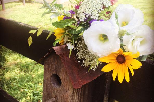 Wedding flowers on birdhouse