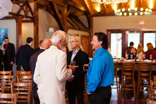 Visitors mingle in the large tasting room