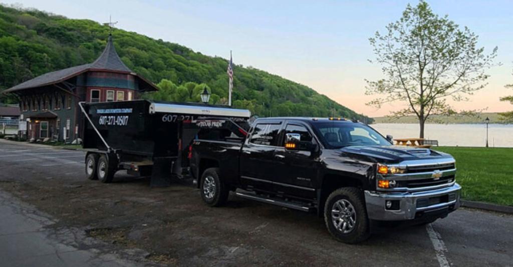 Finger Lakes Dumpster Company - Truck Towing Dumpster