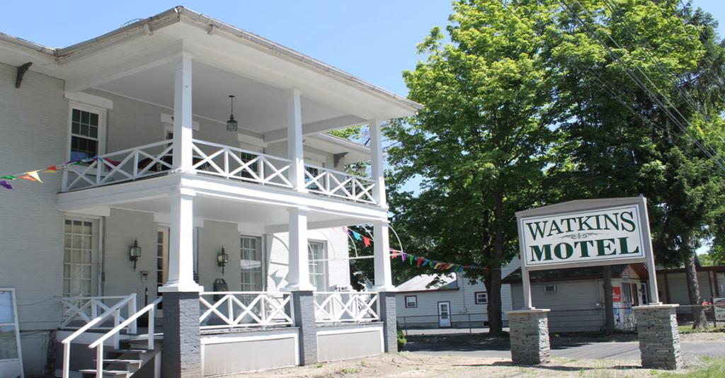 Watkins Motel - Building Exterior with Sign