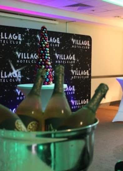 Ultimate 80's & 90's Christmas Party Night with Live Singer at Village Ashton