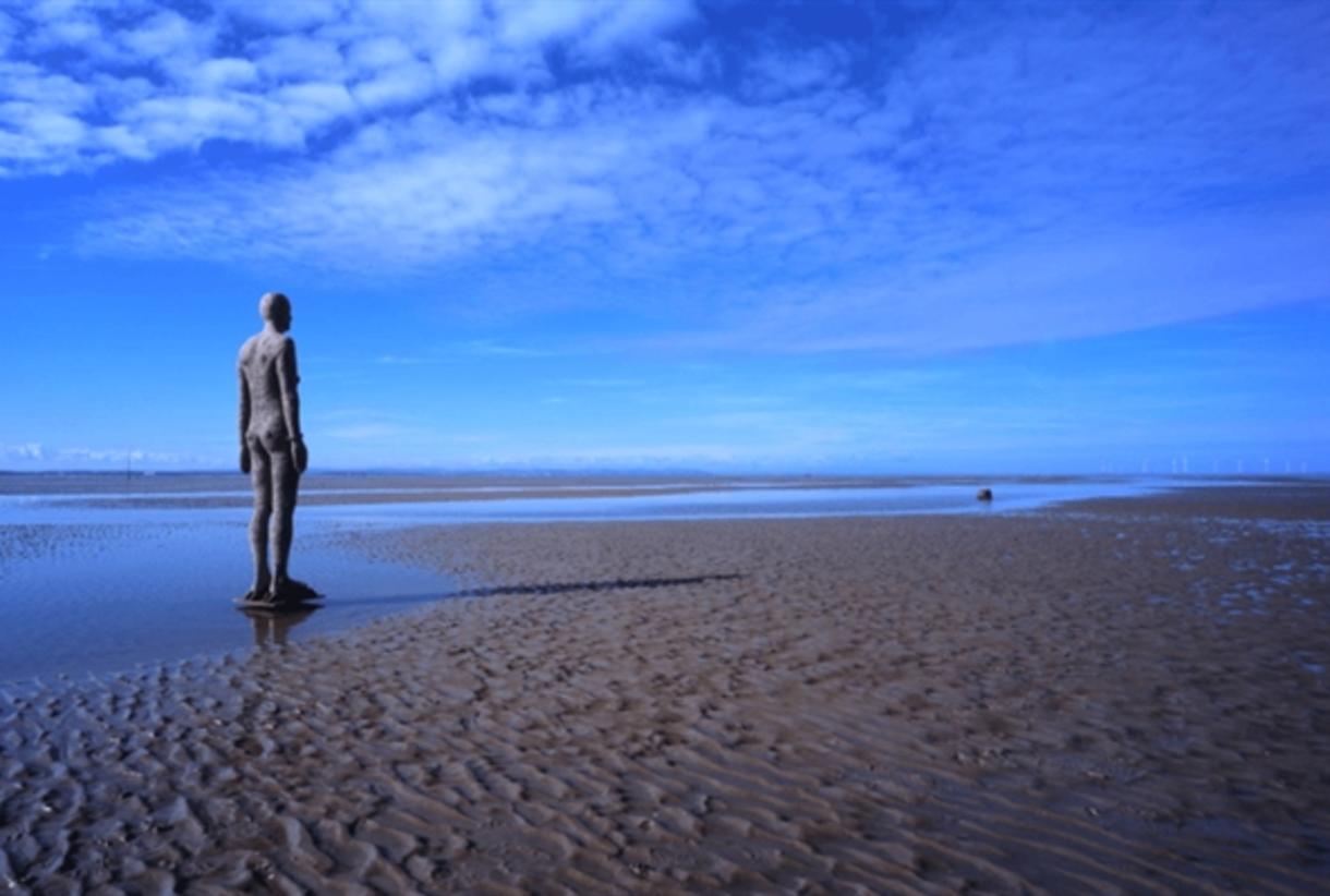 Another Place' by Antony Gormley at Crosby Beach - Visit Southport