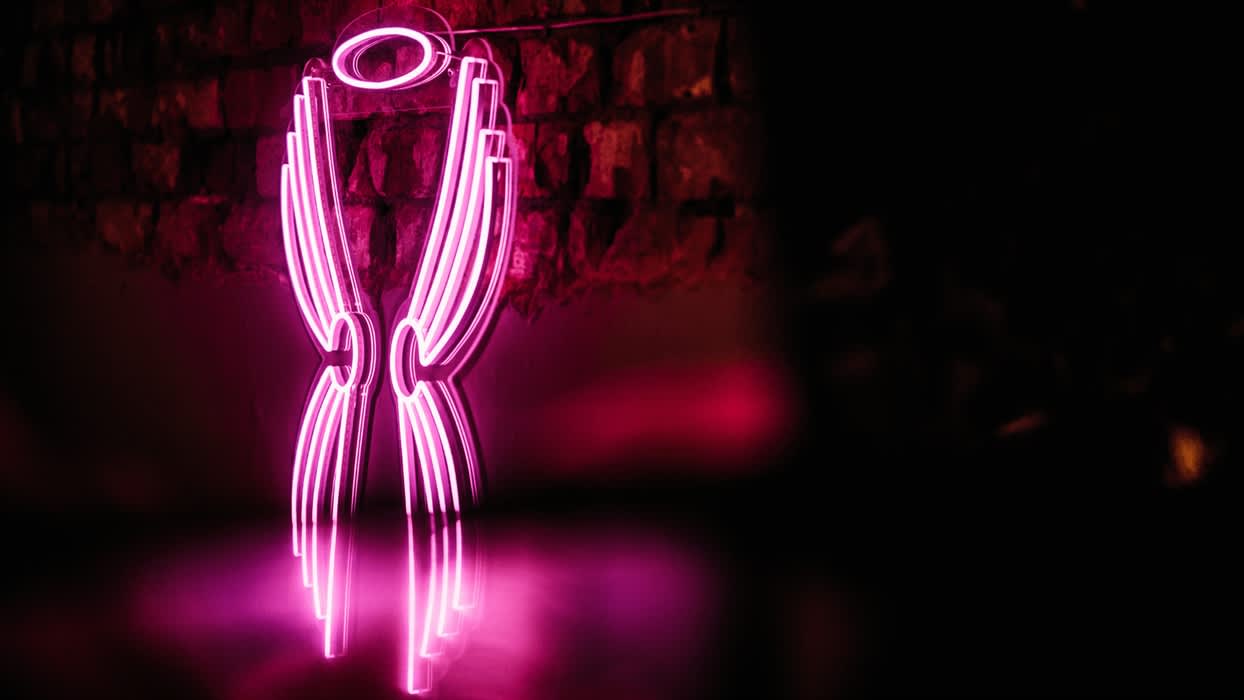 Angel And Two Bibles