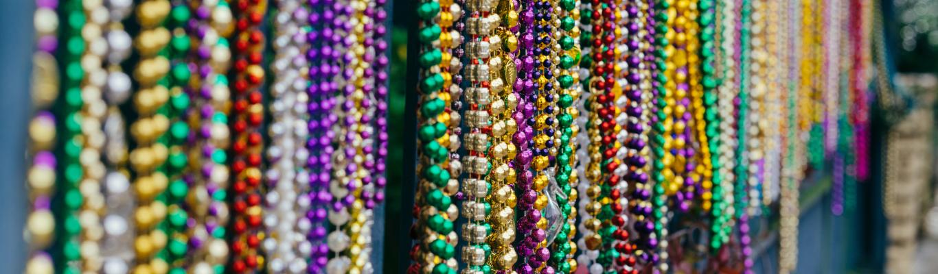 Six Tasteful Ways To Incorporate Mardi Gras Beads Into Your Wedding