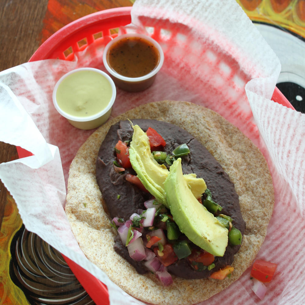 Freakin Vegan Wheat Taco with avocado and black beans