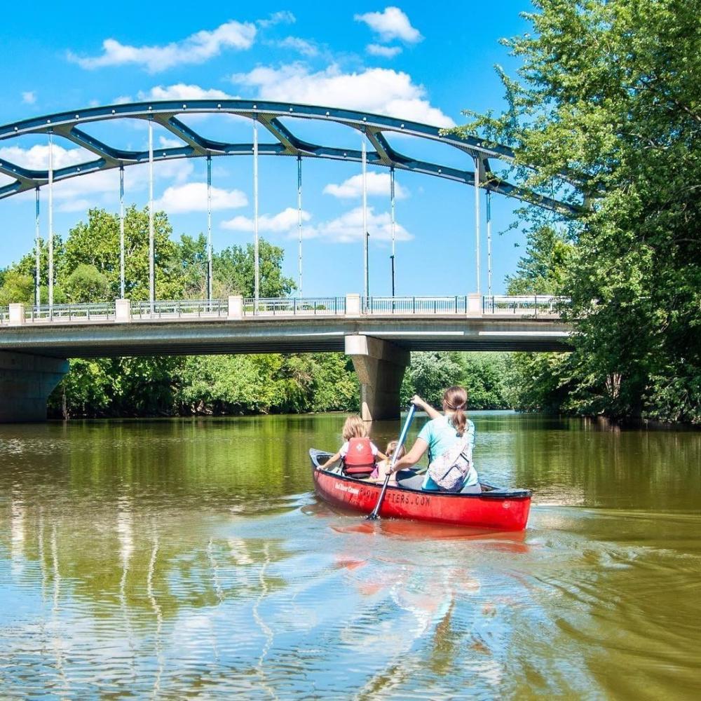 Family Canoe on the River