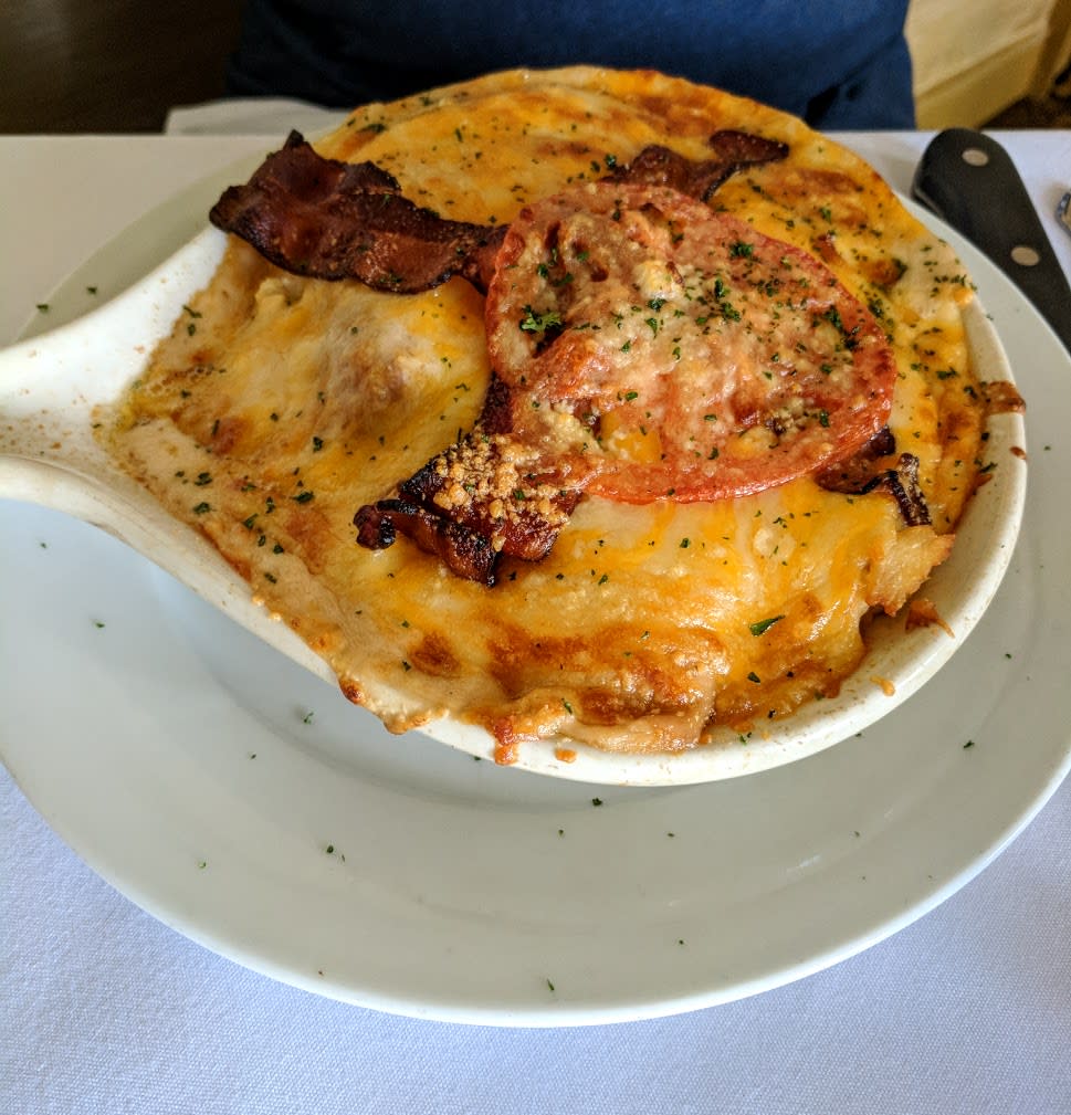 The Kentucky classic dish, a Hot Brown, topped with country ham at Tousey House