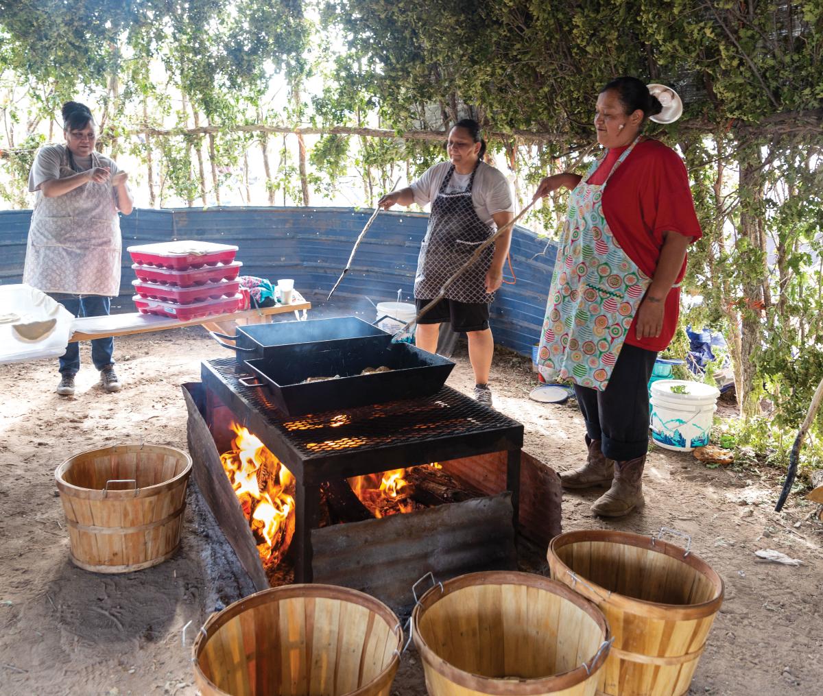 Cooks prep a meal.