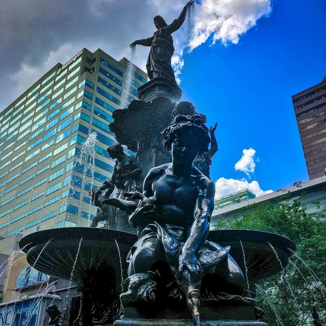 the genius of water statue at fountain square