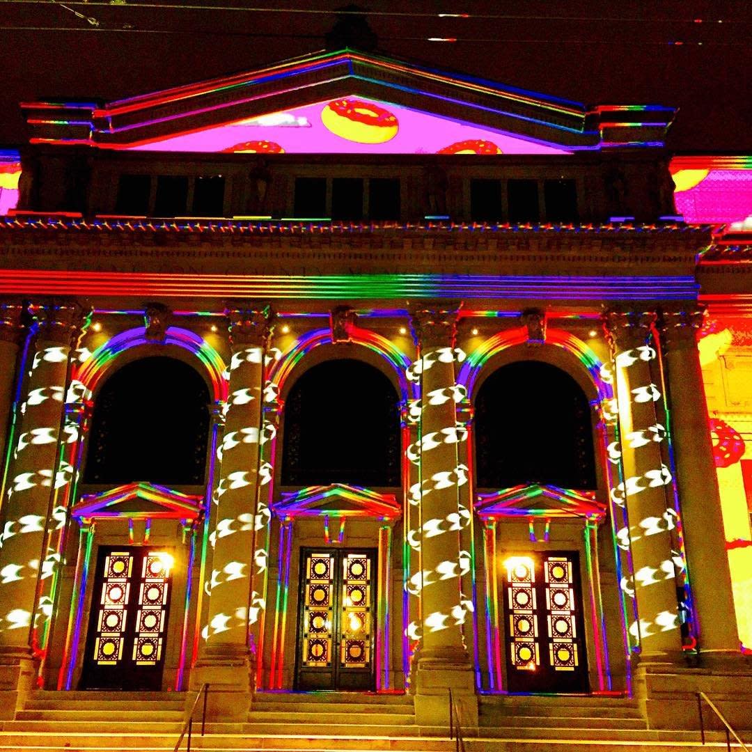 A building in Cincinnati covered in elaborate light displays for BLINK