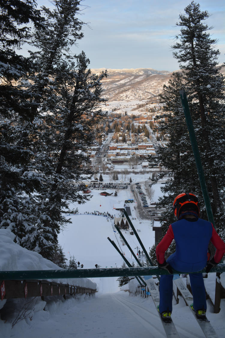 A ski jumper prepares to jump at Historic Howelsen Hill