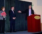 Cliff Donaldson accepts a special Destination Award on behalf of Governor Andrew Cuomo at the Lake Placid CVB/Regional Office of Sustainable Tourism Annual Meeting and Reception. (L-R): Senator Betty Little, Justin Smith, chair, Lake Placid CVB/ROOST Board of Directors; Cliff Donaldson, NYS Department of Labor.