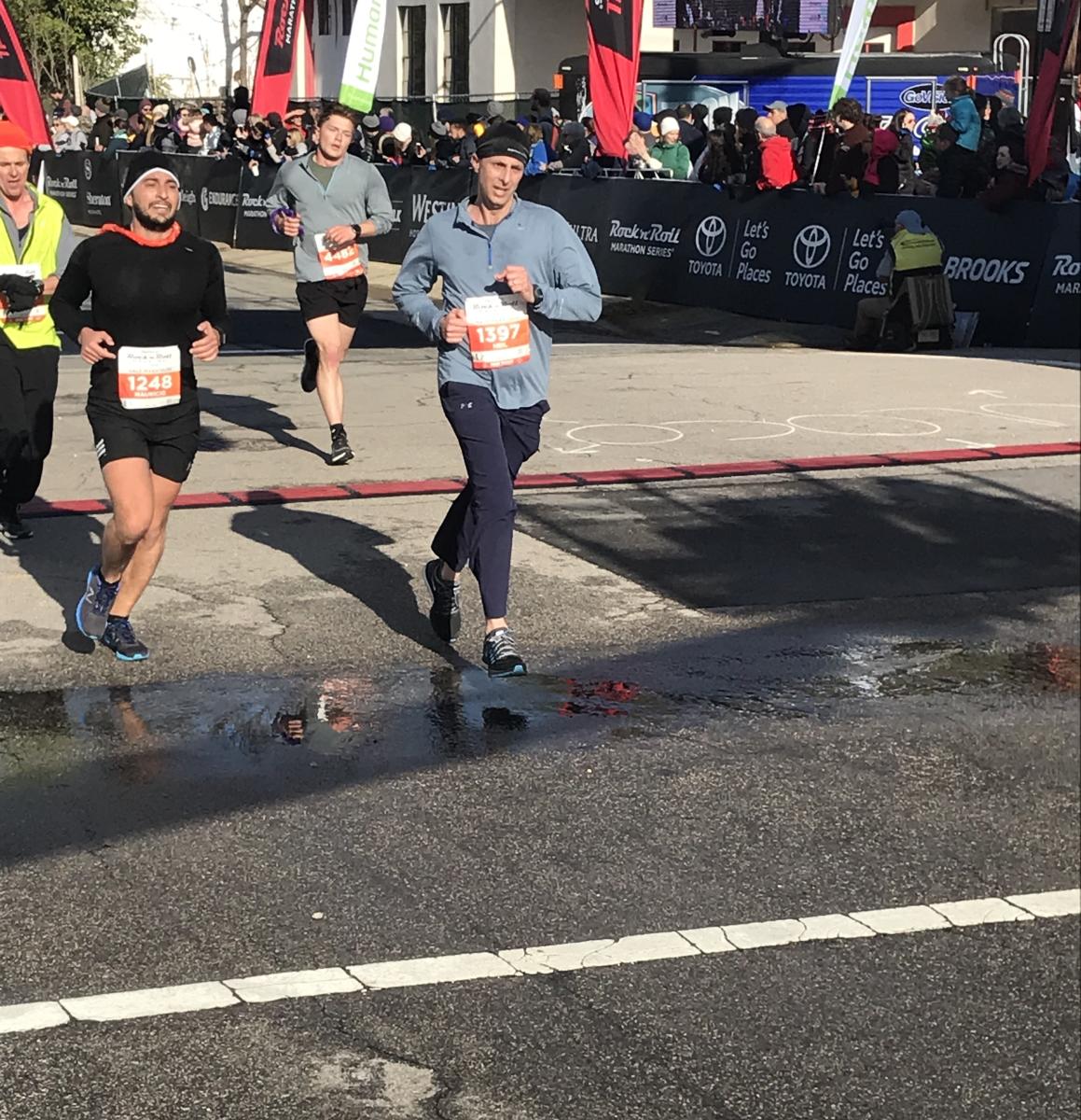 Neil Amato finishing the 2018 Rock 'n' Roll Raleigh Half-Marathon