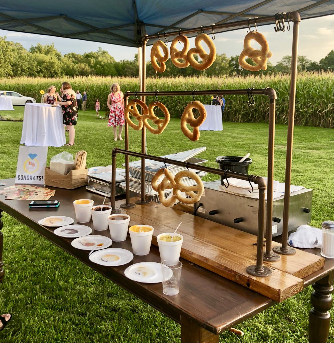Pretzel Bar Station set up in an outside tent at a Frederick wedding