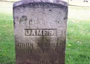 The gravestone of James Brannigan in the Post Cemetery at Fort Ontario. Brannigan was a Union Army soldier who drowned in the Oswego River in 1865.