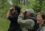 Participants at the annual Roger Tory Peterson Birding Festival on an early morning bird watch. The Birding Festival is one of many activities offered during Chautauqua in June.
