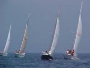 Spectators will be able to watch yachts racing off Oswego Harbor when the Lake Yacht Racing Association (LYRA) brings its annual regatta to Oswego July 30 through Aug. 5. Members of 47 yacht racing clubs around Lake Ontario are expected to compete. (Photo courtesy of John Gary.)