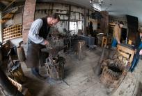Blacksmith Steve Kellogg demonstrates age-old techniques to visitors during last year’s Sugaring Off Sundays event at The Farmers’ Museum. (Photo by Zach Winnie)