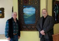 Photographer Francis X. Driscoll (left) and folk artist Michael Lavery in front of their collaborative work “I LOVE NY” at the Kaaterskill Fine Arts gallery in Hunter, N.Y.