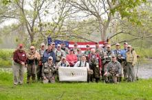 Soldiers and their guides from the Tug Hill/Black River Chapter of Trout Unlimited gathered for a weekend of fly fishing at Douglaston Salmon Run in Pulaski, during the Project Healing Water Fly Fishing program. (Photo by Jessica Trump, Oswego County Tourism Office.)