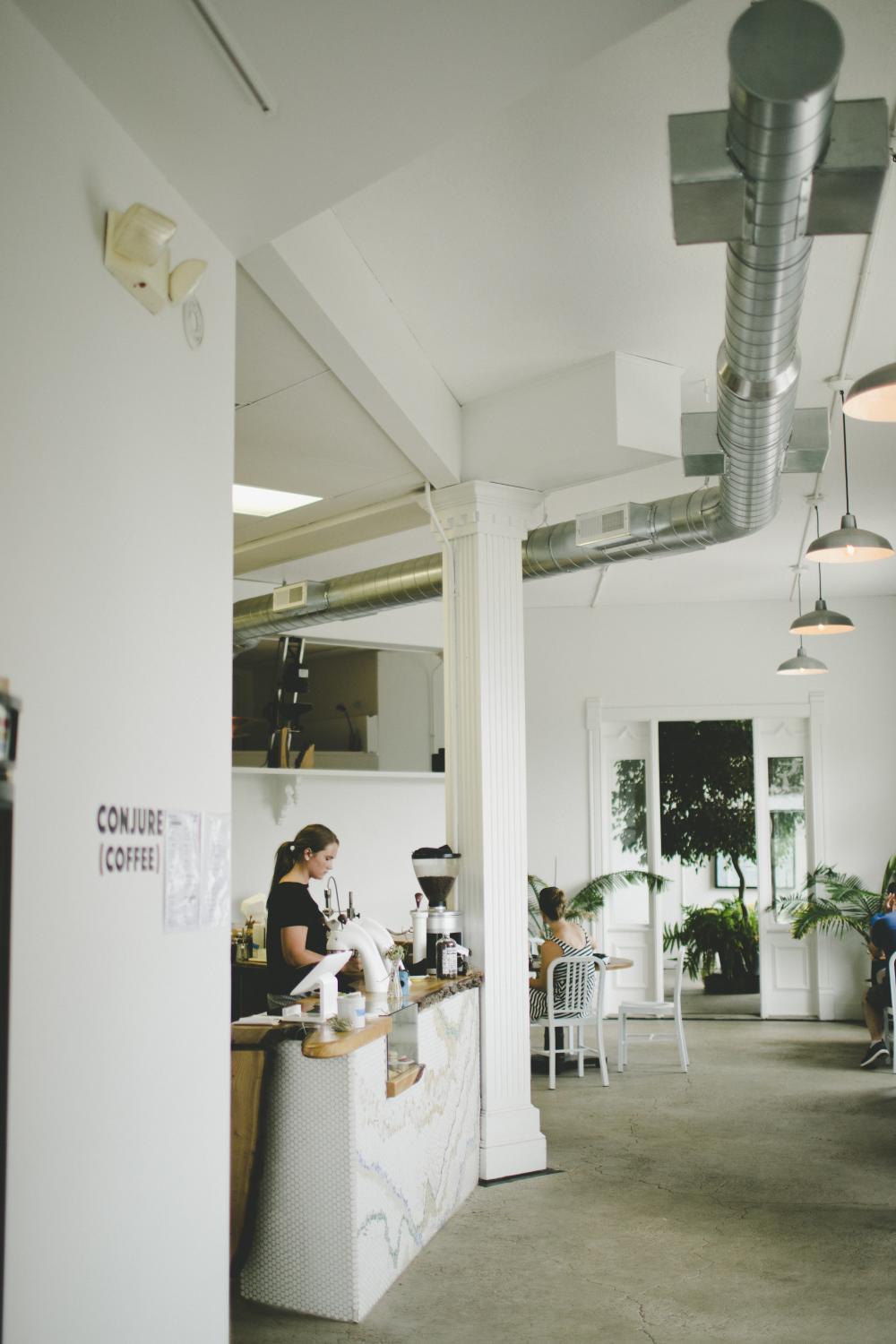 Individuals ordering at Conjure Coffee in Fort Wayne, Indiana