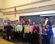 Shaun Pekar and Cameron Green are shown here with a class of elementary school students at a recent outreach program entitled “A Soldier’s Life at Fort Ticonderoga.” Fort Ticonderoga expects to nearly double its reach to students in 2013 through several new educational initiatives.