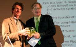 New York City resident Erik Baard (right) has been named the 2011 “Greenest NYer” by I LOVE NEW YORK, New York State’s tourism promotion agency. Baard is shown accepting his award in Brooklyn April 30 from Peter Davidson, Executive Director of Empire State Development.