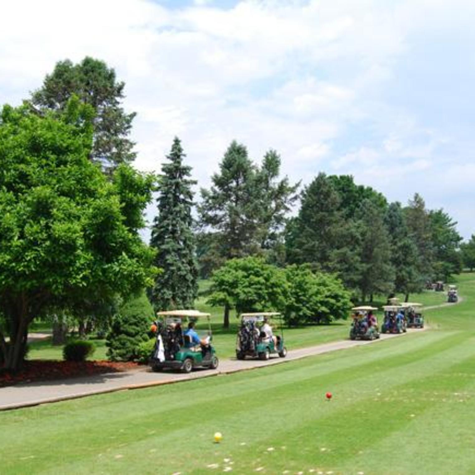 Driving the golf carts at Armitage Golf Club