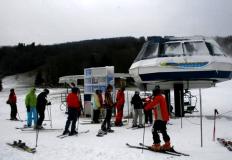 Skiers and Riders in the loading area of the Comet Express Chairlift. Photo: Courtesy of Drew Broderick