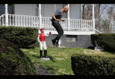Photo: Tim Davis Lawn Jockey Leap Frog, from the series Upstate New York Olympics, 2010 Digital photograph from performance. Image courtesy the artist and Greenberg Van Doren Gallery, New York
